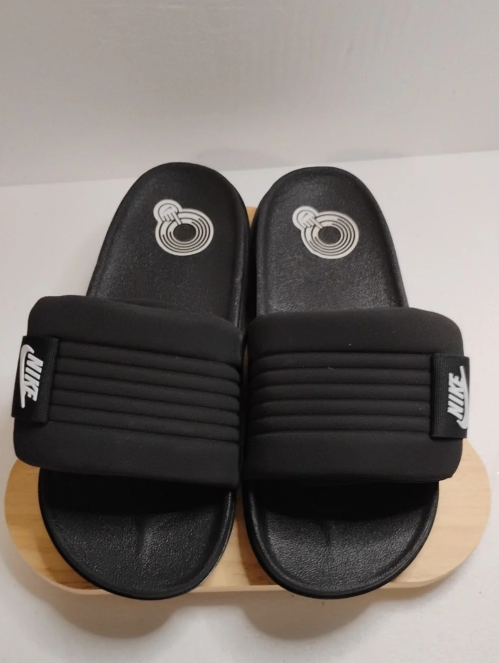 Nike Black Slides with White Logo Accent